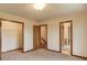 Bedroom with a closet and doorways to other rooms at 1924 Sidneys Cv, Lawrenceville, GA 30043