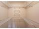 Walk-in closet featuring adjustable wire shelving for optimal storage and organization at 1924 Sidneys Cv, Lawrenceville, GA 30043