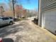 Long, paved driveway offering ample parking space, leading to a garage at 1924 Sidneys Cv, Lawrenceville, GA 30043