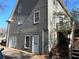 Exterior view of home featuring a walkout basement, deck, stairs and siding at 1924 Sidneys Cv, Lawrenceville, GA 30043