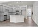 Modern kitchen features stainless steel appliances and a kitchen island with granite countertop at 317 Skye Ln # 51, Cartersville, GA 30121
