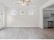 Open concept living room with hardwood floors connects to the kitchen at 317 Skye Ln # 51, Cartersville, GA 30121