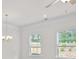 Bright living room features hardwood floors and large windows at 317 Skye Ln # 51, Cartersville, GA 30121