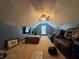 Upstairs bonus room featuring plush carpeting, large television, and comfortable seating arrangements at 8827 Lake Rd, Union City, GA 30291