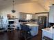 Bright and spacious kitchen featuring stainless steel appliances, a center island, and ample storage at 8827 Lake Rd, Union City, GA 30291