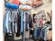 Walk-in closet with shelving and hanging space for organized storage at 417 Ridge Creek Dr, Clarkston, GA 30021