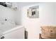 Functional laundry area with washing machine and storage space at 417 Ridge Creek Dr, Clarkston, GA 30021