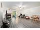 Spacious living room with fireplace and sliding glass door to the outside at 417 Ridge Creek Dr, Clarkston, GA 30021