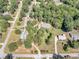 Aerial view of a home nestled among mature trees, offering privacy and seclusion at 5 Ridgewood Cir, Mcdonough, GA 30252