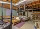 Unfinished basement area with exposed ductwork, concrete walls, and carpet squares at 5 Ridgewood Cir, Mcdonough, GA 30252