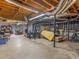Unfinished basement area with exposed ductwork and concrete floors at 5 Ridgewood Cir, Mcdonough, GA 30252