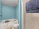 Well-lit bathroom featuring a bathtub, a toilet, a towel rack, and a clear shower door at 5 Ridgewood Cir, Mcdonough, GA 30252