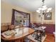 Bright dining space with natural lighting, table, and chairs at 5 Ridgewood Cir, Mcdonough, GA 30252