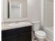Bathroom featuring a sink, toilet, tub, and mirror at 5634 Union Pointe Dr, Union City, GA 30291