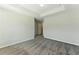 Neutral bedroom features carpet, tray ceiling, and a large window at 5634 Union Pointe Dr, Union City, GA 30291