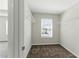Walk-in closet with carpet and wire shelving and a window at 5634 Union Pointe Dr, Union City, GA 30291