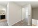 Hallway showing carpet and accesses to the bedroom and bath at 5634 Union Pointe Dr, Union City, GA 30291