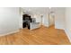 Spacious living area showcasing hardwood floors, stainless appliances, and an open floor plan at 5634 Union Pointe Dr, Union City, GA 30291