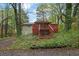 The backyard features a deck and patio at 1513 Spruce Ridge Way, Stone Mountain, GA 30083