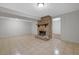 Basement features a stone fireplace and tile flooring at 1513 Spruce Ridge Way, Stone Mountain, GA 30083