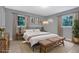 Charming bedroom with ample natural light, wood floors, and neutral color scheme at 1513 Spruce Ridge Way, Stone Mountain, GA 30083