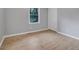 This spacious bedroom has lots of natural light from the two windows at 1513 Spruce Ridge Way, Stone Mountain, GA 30083