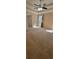 Carpeted bedroom featuring a ceiling fan and large windows for great natural light at 1763 Emerald Dr, Jonesboro, GA 30236