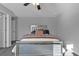 Bedroom features a stylish bed with a mirrored base, decorative pillows, and modern finishes throughout at 2650 Longacre Park Way, Lawrenceville, GA 30044