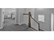 Hallway featuring carpeted floors, gray walls, white trim, and a view of a bedroom at 2650 Longacre Park Way, Lawrenceville, GA 30044
