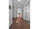 Inviting entryway featuring hardwood floors and view into other living spaces at 2650 Longacre Park Way, Lawrenceville, GA 30044