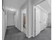 Hallway with access to a bathroom and bedrooms at 2650 Longacre Park Way, Lawrenceville, GA 30044