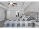 Bright and airy main bedroom with a comfortable bed, natural light, and access to closet at 2650 Longacre Park Way, Lawrenceville, GA 30044
