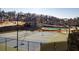 Recreational amenities featuring outdoor tennis courts, perfect for active lifestyles in the community at 2650 Longacre Park Way, Lawrenceville, GA 30044