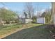 Large backyard with storage sheds and a fence, perfect for outdoor activities and storage at 340 Brooks Sw Ave, Atlanta, GA 30310
