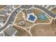 Aerial view showing the pool, tennis court, playground, and sidewalks of the neighborhood at 3739 Silvery Way, Powder Springs, GA 30127