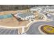 Aerial view of community amenities including a pool, pickleball court, playground, and clubhouse at 3739 Silvery Way, Powder Springs, GA 30127
