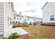 Backyard with a concrete patio and grass, enclosed by a wooden fence, offers privacy at 3739 Silvery Way, Powder Springs, GA 30127