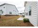 Backyard features a small patio and green space at 3739 Silvery Way, Powder Springs, GA 30127