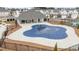 Community pool featuring a large pool with a cover and a covered patio area at 3739 Silvery Way, Powder Springs, GA 30127