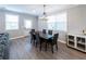 Dining room features a chandelier and table for six, perfect for Gathering meals at 3739 Silvery Way, Powder Springs, GA 30127