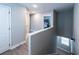 Upstairs landing with wood floors and views to multiple bedrooms at 3739 Silvery Way, Powder Springs, GA 30127
