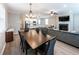 Inviting living space with a fireplace, dining table, and open kitchen layout at 3739 Silvery Way, Powder Springs, GA 30127