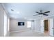 Spacious primary bedroom featuring a ceiling fan, ample natural light, and an ensuite bathroom at 3739 Silvery Way, Powder Springs, GA 30127