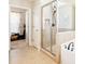 Modern bathroom featuring separate tub and shower with glass door at 110 Canyon Ridge Trl, Canton, GA 30114