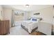 Bright bedroom featuring a comfortable bed, large window, and stylish decor at 110 Canyon Ridge Trl, Canton, GA 30114