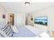 Comfortable bedroom with neutral colors and a TV at 110 Canyon Ridge Trl, Canton, GA 30114