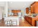 Bright kitchen featuring custom cabinets, stainless steel appliances, and granite countertops at 110 Canyon Ridge Trl, Canton, GA 30114