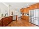 Gourmet kitchen with stainless steel appliances, custom cabinetry, and a pantry at 110 Canyon Ridge Trl, Canton, GA 30114