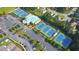 Aerial view of a neighborhood featuring tennis courts, pool, and clubhouse amenities at 172 Knightwood Point, Acworth, GA 30101