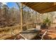 Expansive deck is perfect for outdoor gatherings, providing ample seating and scenic views of the surrounding landscape at 172 Knightwood Point, Acworth, GA 30101